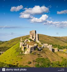 Corfe Castle on its hill above the beautiful Dorset countryside ...